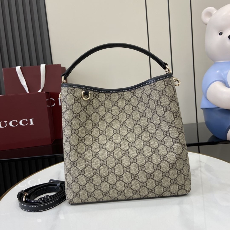 G*u*i top handle bags